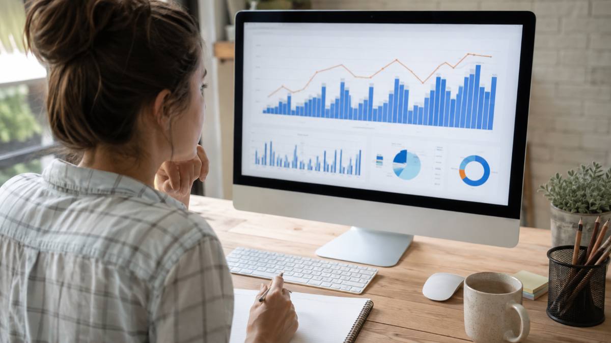 Analyzing Google Search Console performance report charts on a monitor